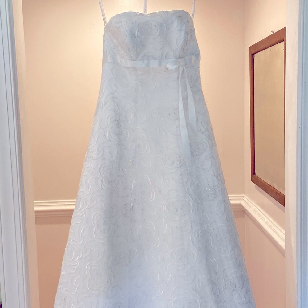Oleg Wedding Cassini collection style CV136. White from David’s Bridal shop